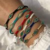 oly-f040c1ee762e1632cb6055caf32b855e Wholesale Bohemian Style Friendship Bracelet Handmade Woven Rope Colorful Beaded Beaded Bracelet Retro exotic jewelry