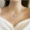 Wholesale Alloy diamond-encrusted Swarovski swan clavicle chain, gradient blue swan, rose gold, and black swan necklace.