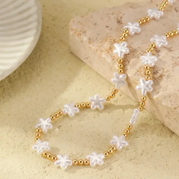Wholesale Women’s Star Choker Necklace With Waterproof Non Tarnish Copper, Golden Plated Finish And Imitation Pearl Beaded Chain