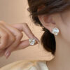 oly-f1ad25eeb610ff00fb126fc661741f7b Wholesale S925 Silver Needle Light Luxury Niche Camellia Earrings Women's Trendy Cold Style High-end Fashion French Flower Ear Jewelry