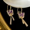 oly-f3303619f866d40511e5e36d19c0755a Wholesale Black butterfly earrings high-grade light luxury slightly elegant all-match earrings earrings niche design