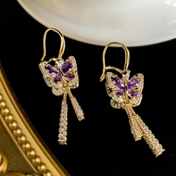 oly-f3303619f866d40511e5e36d19c0755a Wholesale Black butterfly earrings high-grade light luxury slightly elegant all-match earrings earrings niche design