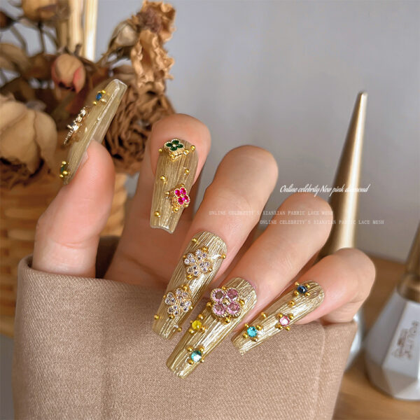 Wholesale Alloy nail art decorations, zircon lucky four-leaf clover with rhinestones, 3D nail decorations.
