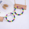Wholesale color woven alloy handmade rice beads earrings  trend Carnival design sense earrings