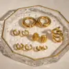 Wholesale 304 Stainless Steel C Shape Solid Color PVD Coated 18K Real Gold Plated Real Gold Plated 18K Gold Vacation Simple Style IG Style Waterproof Non Tarnish Asymmetrical Gold Ear Cuffs