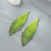oly-f5c62c95bbcd5f6b6f2d57ae3ff63990 Wholesale Original Design Handmade Rice Bead Tassel Earrings Personalized Bohemian Tassel Earrings