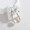 Wholesale French Retro Fashion Versatile Pearl Tassel Knotted Earrings Elegant Light Luxury Stainless Steel Earrings For Women Factory Direct Sale