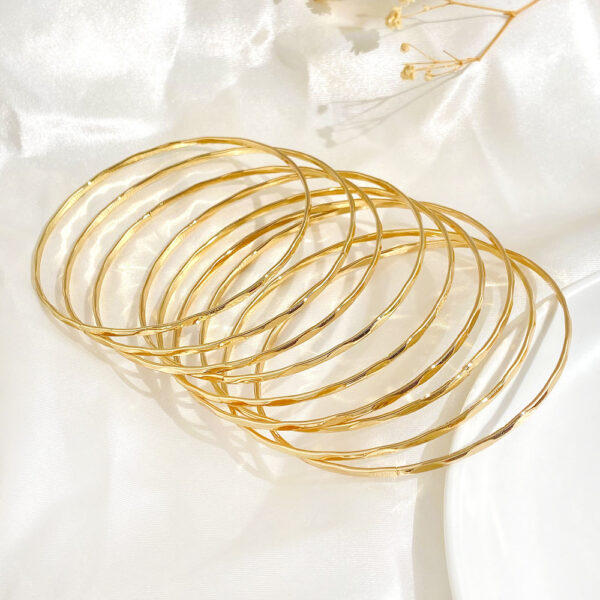 oly-f61eb09eb1b94203653cf6679136be94 Wholesale multi-layer bracelet suit female personality temperament alloy geometric stacked bracelet