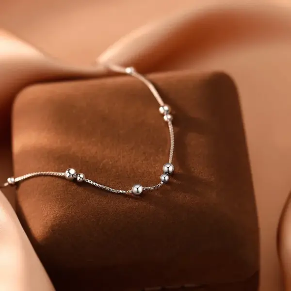 Wholesale Simple Style Ball Bracelet For Women In 925 Sterling Silver With Electroplated Gold Plating Featuring Beading Craft