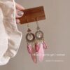 oly-f76851dab939a61dcfee2f94732ac20a Wholesale Ethnic Style Retro Feather Earrings Long Multi-Color Holiday Feather Earrings Beaded Design Circle Earrings