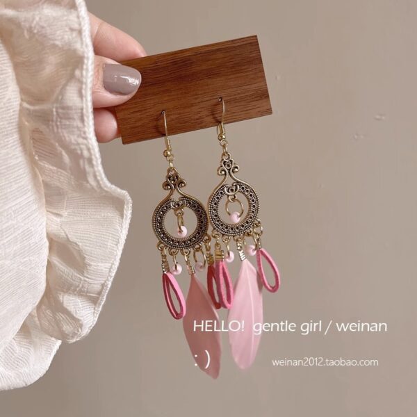 oly-f76851dab939a61dcfee2f94732ac20a Wholesale Ethnic Style Retro Feather Earrings Long Multi-Color Holiday Feather Earrings Beaded Design Circle Earrings
