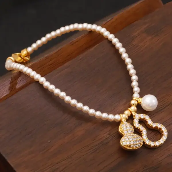 Wholesale Fashionable Luxury Pearl Bracelet Original Design Round Xiaomi Pearls Gourd Pendant Lucky Charm Safe Keeping Women's Bracelet