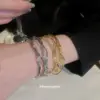 Wholesale Round Copper Bangle With Real Gold Plating And Rhinestone Inlay In Elegant Gold