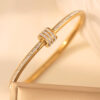 oly-fa5f1cf95ab35e7ed270663b300df4e9 Wholesale Stainless steel non-fading jewelry, electroplated gold, slim waist titanium steel bracelet