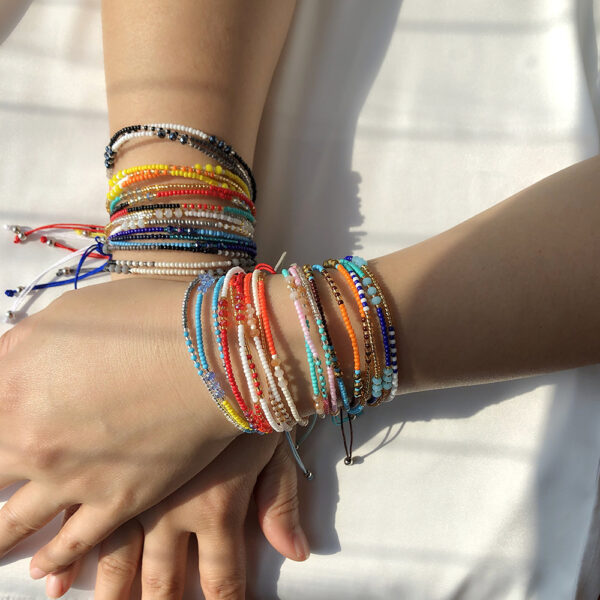 oly-fa7837a53d5ff7bad5ea9173f353e7ac Wholesale Jewelry Hand Beaded Crystal Bracelet Bohemian Ethnic Style Color Rice Bead Bracelet Women's Braided Rope Hand Rope