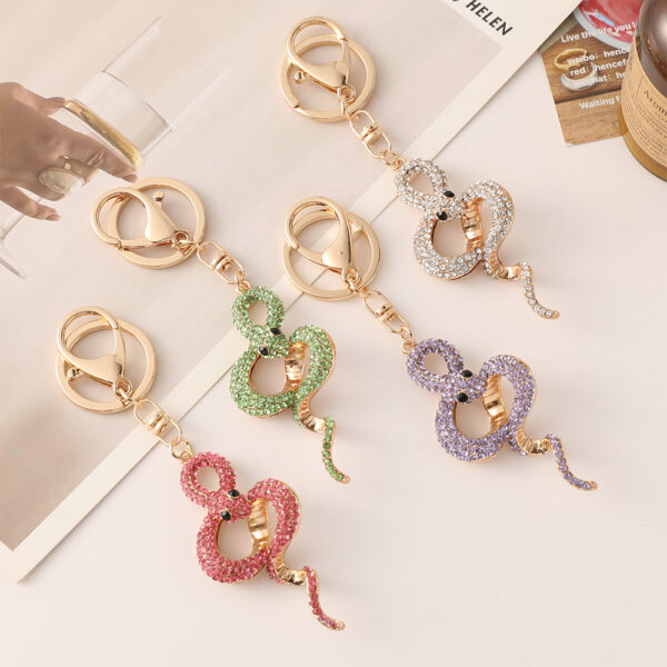oly-fad4e81bc3d3cf092a007f6daab37bc4 Wholesale Zodiac series metal diamond animal snake key chain pendant exquisite bag ornaments small gifts