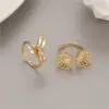 Wholesale Women’s Bow Tie Ring In Copper With Golden Plated Electroplated Finish Featuring Zircon Inlay
