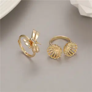 Wholesale Women’s Bow Tie Ring In Copper With Golden Plated Electroplated Finish Featuring Zircon Inlay