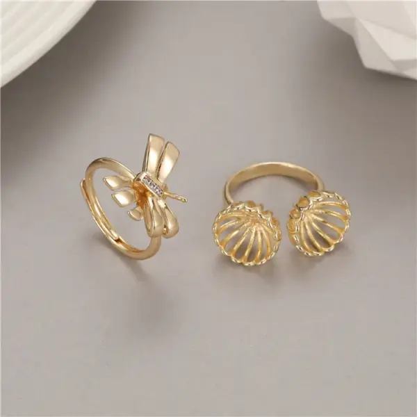 Wholesale Women’s Bow Tie Ring In Copper With Golden Plated Electroplated Finish Featuring Zircon Inlay