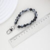 Wholesale Light Luxury Black and White Ink Beads Short Mobile Phone Chain Earphone Case Car Key Pendant Colorful Wrist Rope Handheld Chain Beads