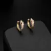 Wholesale Unisex Snake Clip Earrings In Copper With 14K Real Gold Plated Electroplated Finish Featuring Artificial Gemstones