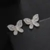 Wholesale Fashionable Butterfly Stud Earrings For Women Hip Hop Copper Embedded Zirconia 3D Butterfly Full Zircon Earrings