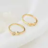 Wholesale Women’s Star Ring In Copper With 14K Real Gold Electroplated Finish Featuring Moissanite Inlay