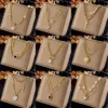 Wholesale Ig Style Simple Style Geometric Titanium Steel Plating Inlay Artificial Pearls Rhinestones Shell Necklace