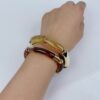 oly-fd26eeb61e351875cf898f5eb5387171 Wholesale fashion creative tube ball elastic bracelet acrylic two-color curved tube round tube bracelet