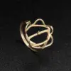 Wholesale Women’s Flowers Ring In Copper With Golden Electroplated Finish Featuring Gem Inlay