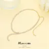 Wholesale Women’s Long Snake Chain Necklace With Tassel Craft, Electroplated Copper Featuring Zircon Inlay