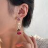 Wholesale ins elegant elegant elegant eternal flower earrings female niche design retro Mori Freshwater Pearl Rose earrings fashion