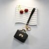 oly-2e0ebd85a0a9d47156ca2912e0342fcb Wholesale Multi Colored Leather Buckle Headphone Storage mini Coin Purse Keychain