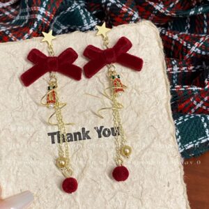 Flocking red bow tassel earrings