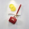 oly-97615cfb8fa2637fd648de0b738f8cff Wholesale Multi Colored Leather Buckle Headphone Storage mini Coin Purse Keychain