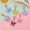 oly-99217042963f89873d153f88dc8c4581 Wholesale Cute Colorful Butterfly Acrylic Keychain Charm