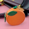 oly-a6ce5651a94f5d424dccdc8e9286220e Wholesale PU Leather Fresh Mini Orange Fruit Coin Purse Keychain Fashion Accessory