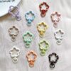 oly-c2eb803c129080be62e53d57dae1eaa3 Wholesale Hand-Painted Flower Spring Keychain Zinc Alloy Cartoon DIY Accessory