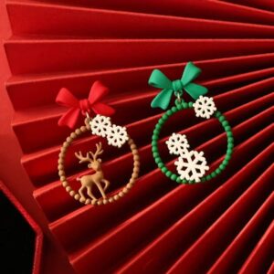 Asymmetrical snowflake deer earrings