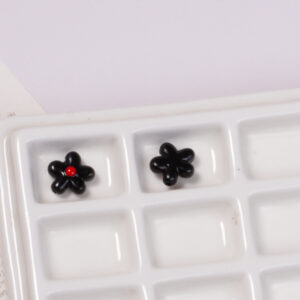 Black dotted oil flower