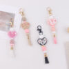 oly-02dca2e08f70e651a8badd7a6b3db5b8 Wholesale Silicone Heart Keychain Bag Charm Korean Style Pink Tassel Pendant Gift
