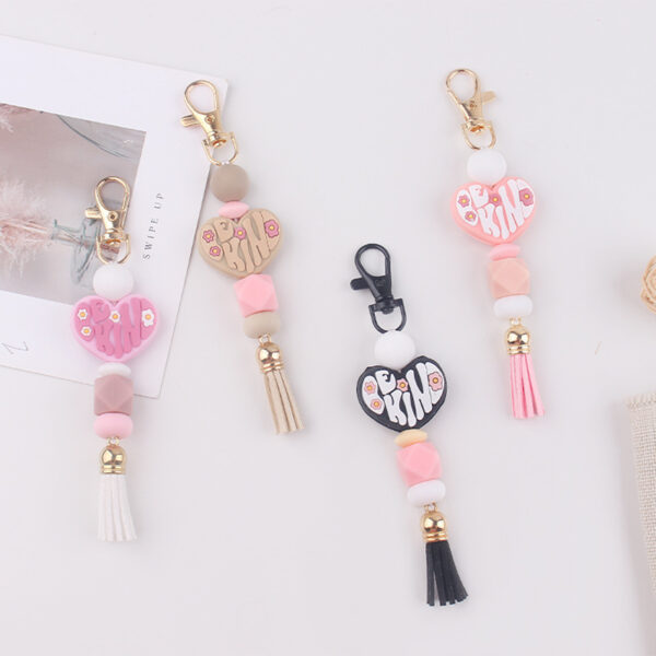 oly-02dca2e08f70e651a8badd7a6b3db5b8 Wholesale Silicone Heart Keychain Bag Charm Korean Style Pink Tassel Pendant Gift
