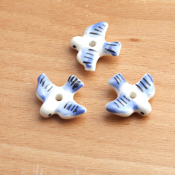 oly-033018ce37c07552fcc767ce8aa4d765 Wholesale Hand Painted Blue White Seagull Ceramic Beads Decorative DIY Accessory for Jewelry Making Gift Boutique