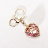 oly-0816400f91d7f98ff25a56688958eb13 Wholesale Fashion Metal Heart Keychain Pendant, Red Hollow Design, European Style Bag and Key Accessory OLY Exclusive