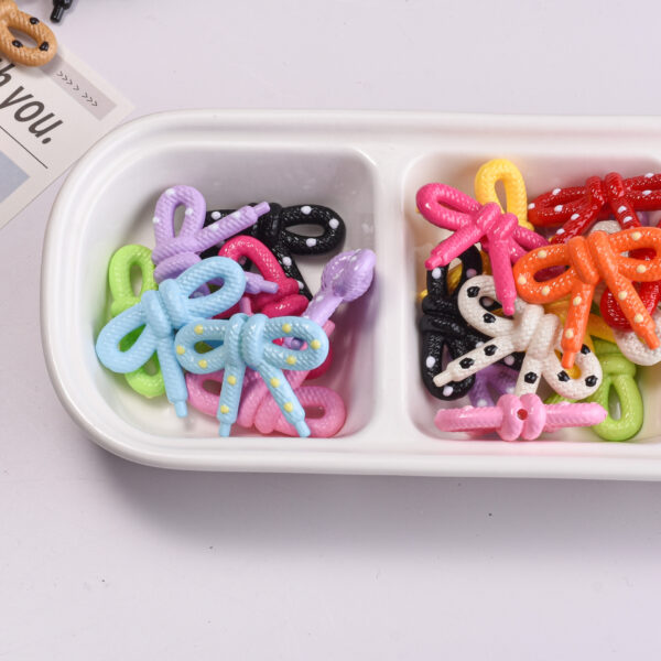 oly-086a089bb1e0204cce62adb5f322b838 Wholesale Acrylic Bow Tie Beads Colorful Machine Painted for DIY Phone Strap Keychain Fashion Accessory