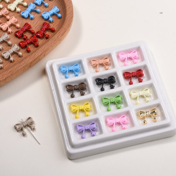 oly-08a60ad6c3b132f3f12af2a3b695e44e Wholesale Scattered Mixed Color Alloy Beads with Hemp Rope Bow and Star Pattern DIY Craft Supply