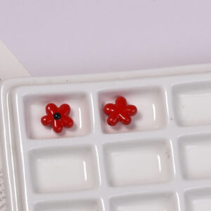Red dotted oil flower