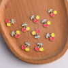 oly-0df6df3799cc9e4ecc6036dfbafae660 Wholesale Cherry Food Play Pendant Yellow Alloy Jewelry Accessory for DIY and Boutique Resale