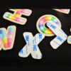 oly-11ec6d30663bb65fc02bd26ae477a5fe Wholesale Colorful Embroidered Letters Polyester Self-Adhesive Patches DIY Accessory for Clothes Bags Phones