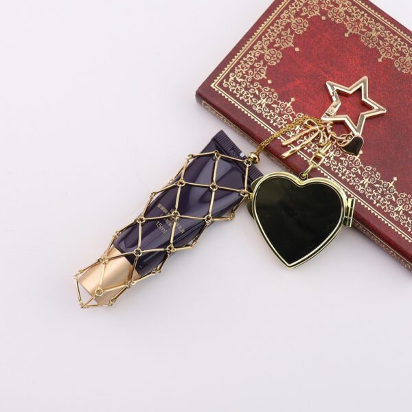 oly-167bcd4c163b674845eda2a4353db007 Wholesale Metal Mesh Pouch Bag Charm Keychain Trendy Personalized Design for Everyday Use